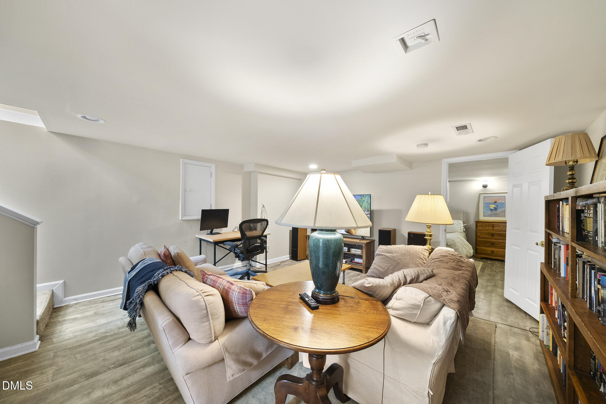 1108 Brooks Avenue Raleigh, NC 27607 - Photo 25 of 35 a living room with fireplace furniture and a wooden floor