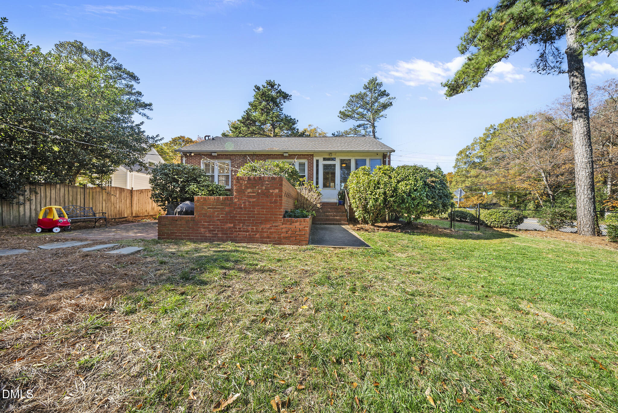 1108 Brooks Avenue Raleigh, NC 27607 - Photo 30 of 35 a front view of a house with a yard