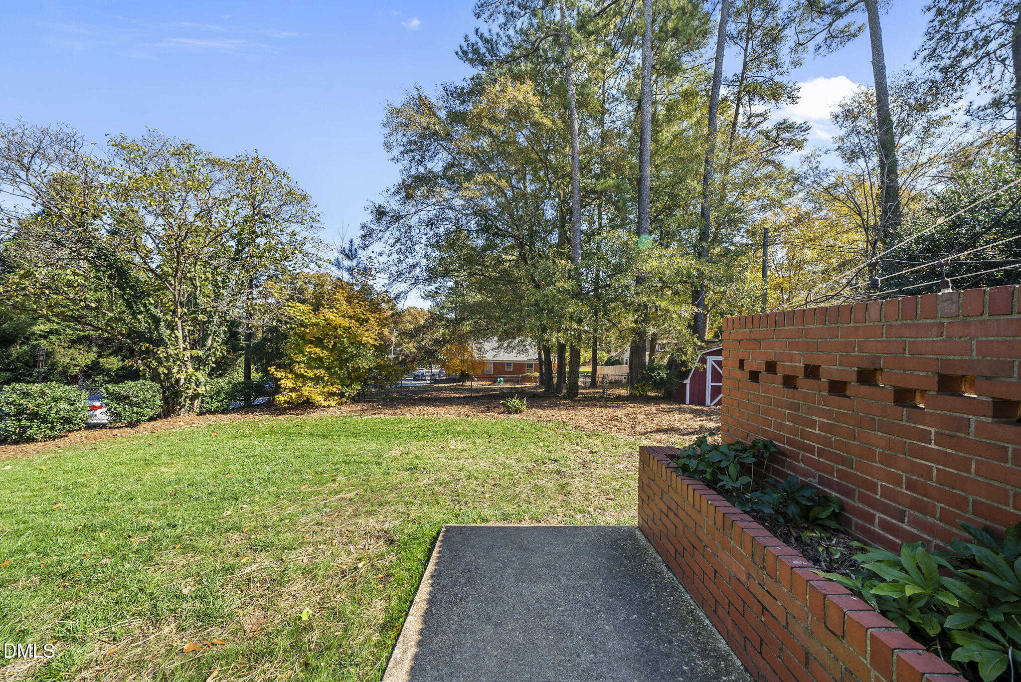 1108 Brooks Avenue Raleigh, NC 27607 - Photo 32 of 35 a view of a garden with wooden fence