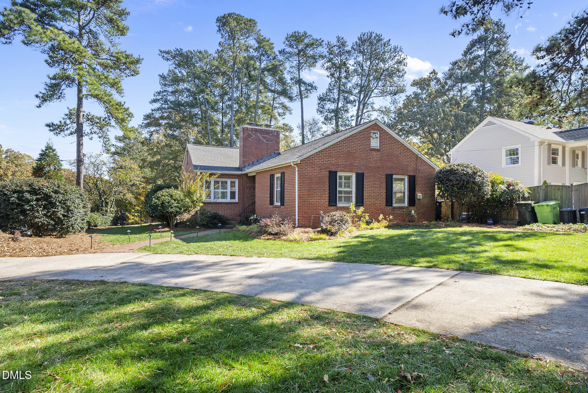 1108 Brooks Avenue Raleigh, NC 27607 - Photo 35 of 35 a front view of a house with a yard and garage