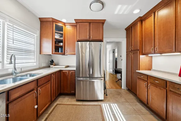 a kitchen with a sink and a window