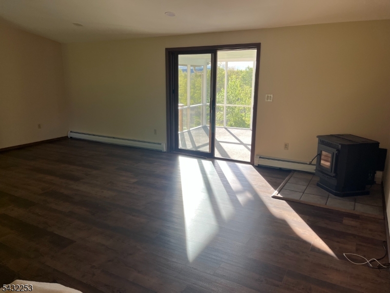 31 Countryside Road Columbia, NJ 07832 - Photo 12 of 31 a view of an empty room and wooden floor