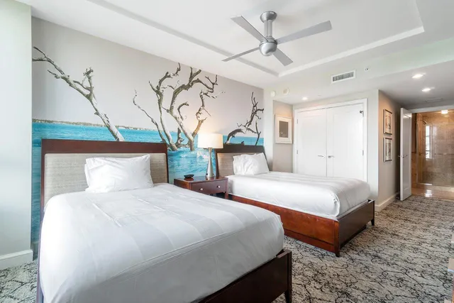 a bedroom with bed and window