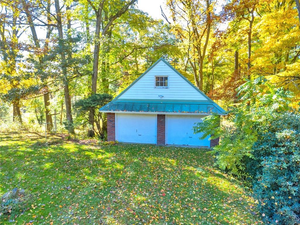 5572 Sandy Lake Polk Road Sandy Lake, PA 16145 - Photo 19 of 36 a view of a back yard of the house