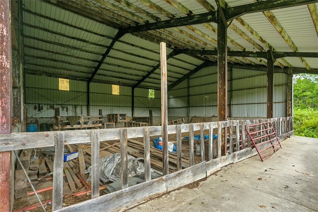 5572 Sandy Lake Polk Road Sandy Lake, PA 16145 - Photo 24 of 36 a view of a chairs and table in the patio