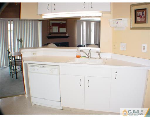 635 Edpas Road New Brunswick, NJ 08901 - Photo 6 of 10 a bathroom with a sink and a mirror