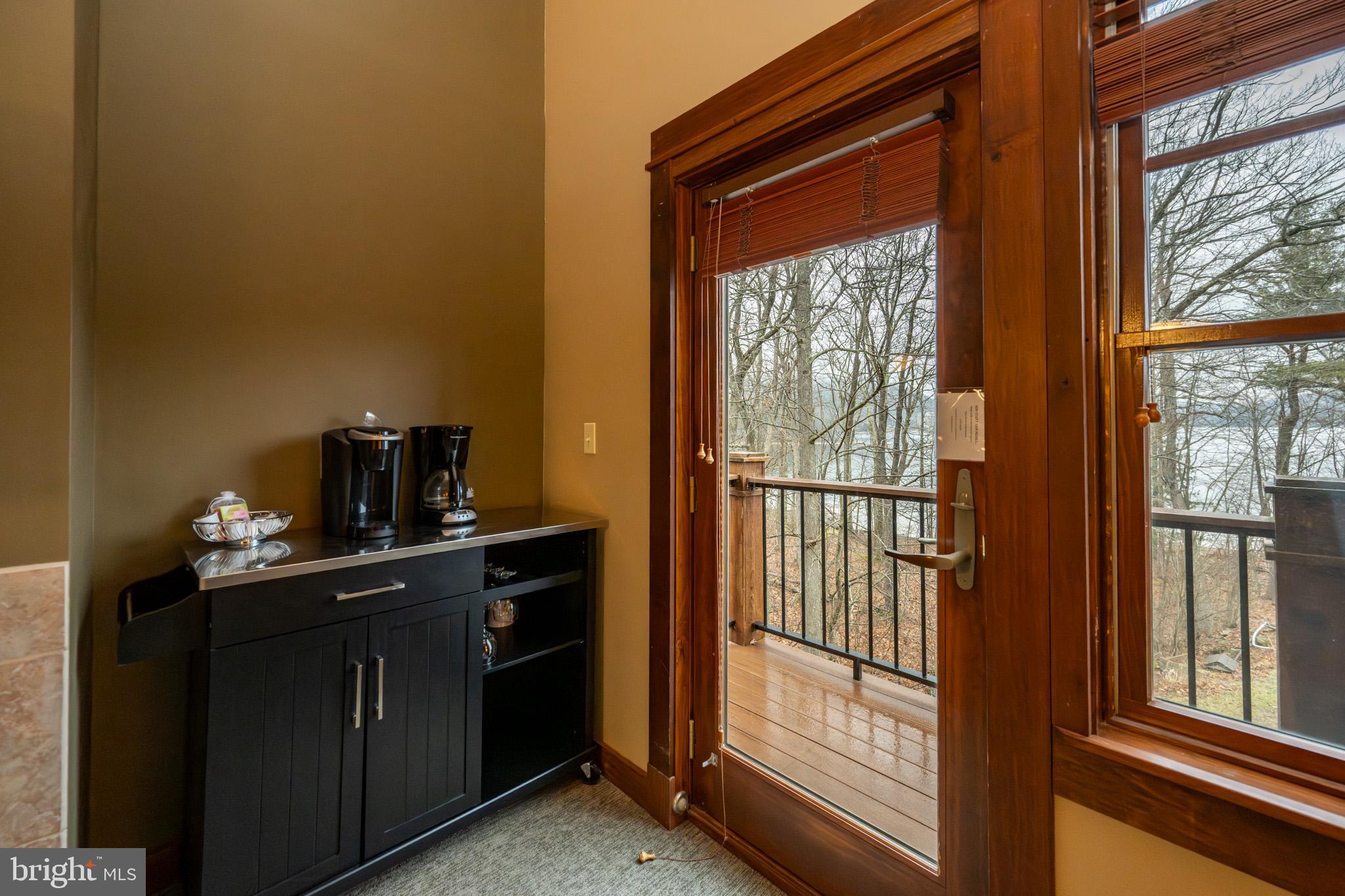 565 Glendale Road, Unit B206 Oakland, MD 21550 - Photo 14 of 32 Cozy corner with scenic outdoor access.
