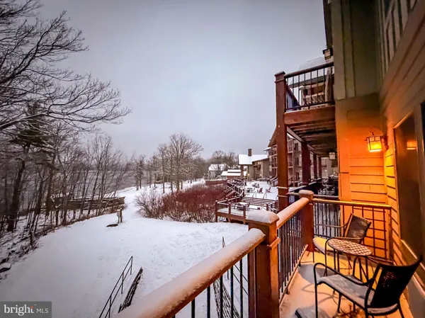 a view of a house with a snow on the wall