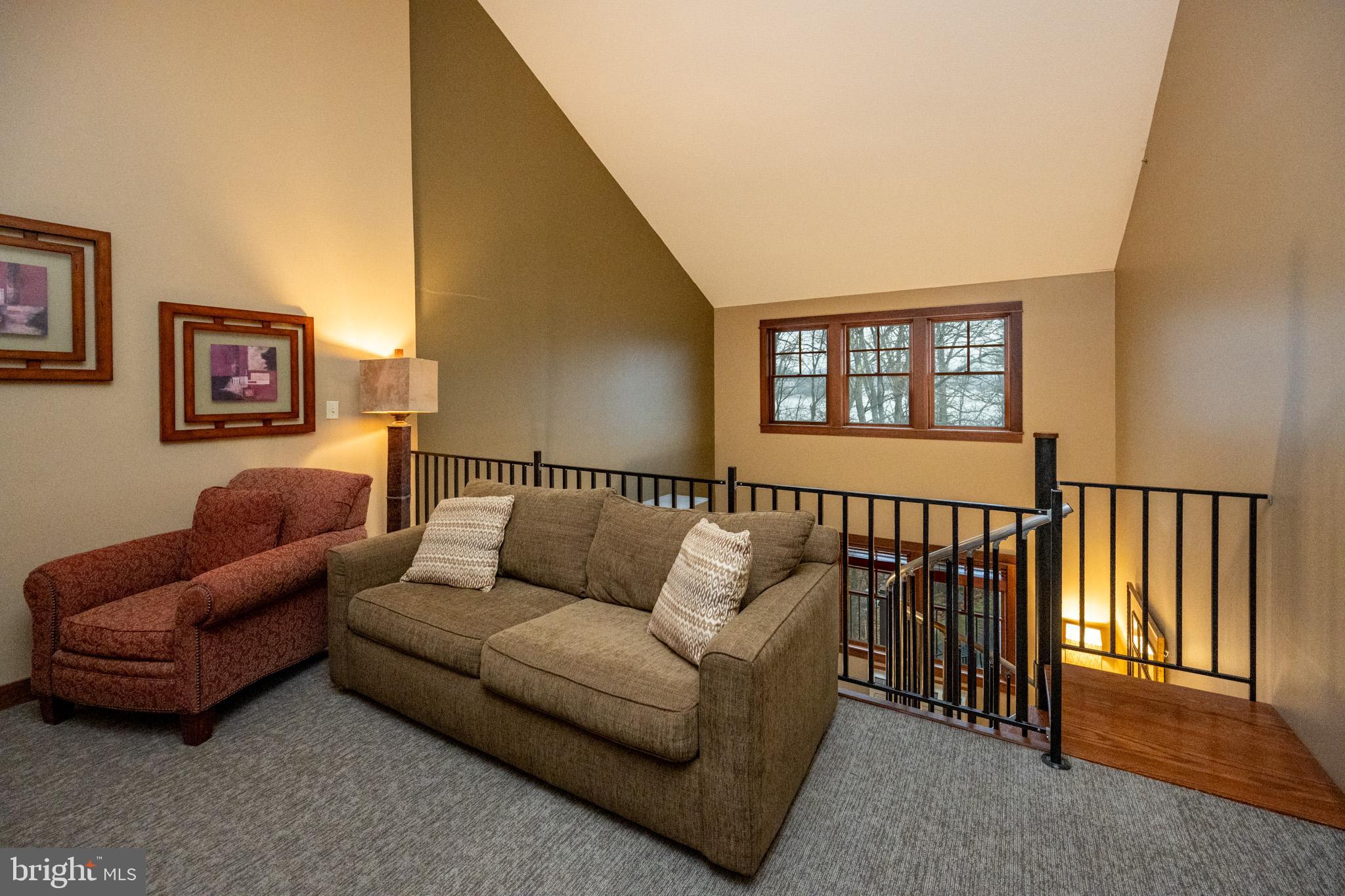 565 Glendale Road, Unit B206 Oakland, MD 21550 - Photo 6 of 32 Cozy loft with inviting natural light.