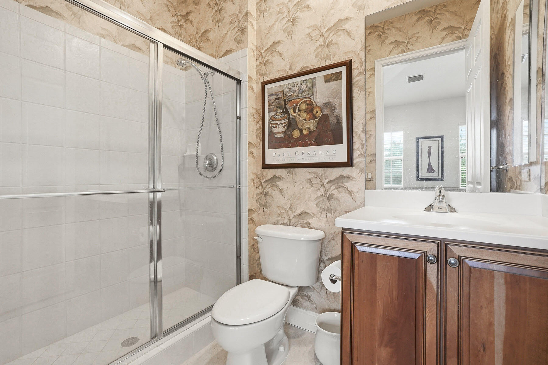 8605 Champions Point, Unit 103 Naples, FL 34113 - Photo 35 of 44 a bathroom with a toilet sink and shower