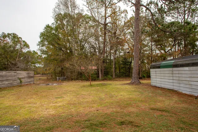 a view of a house with a park