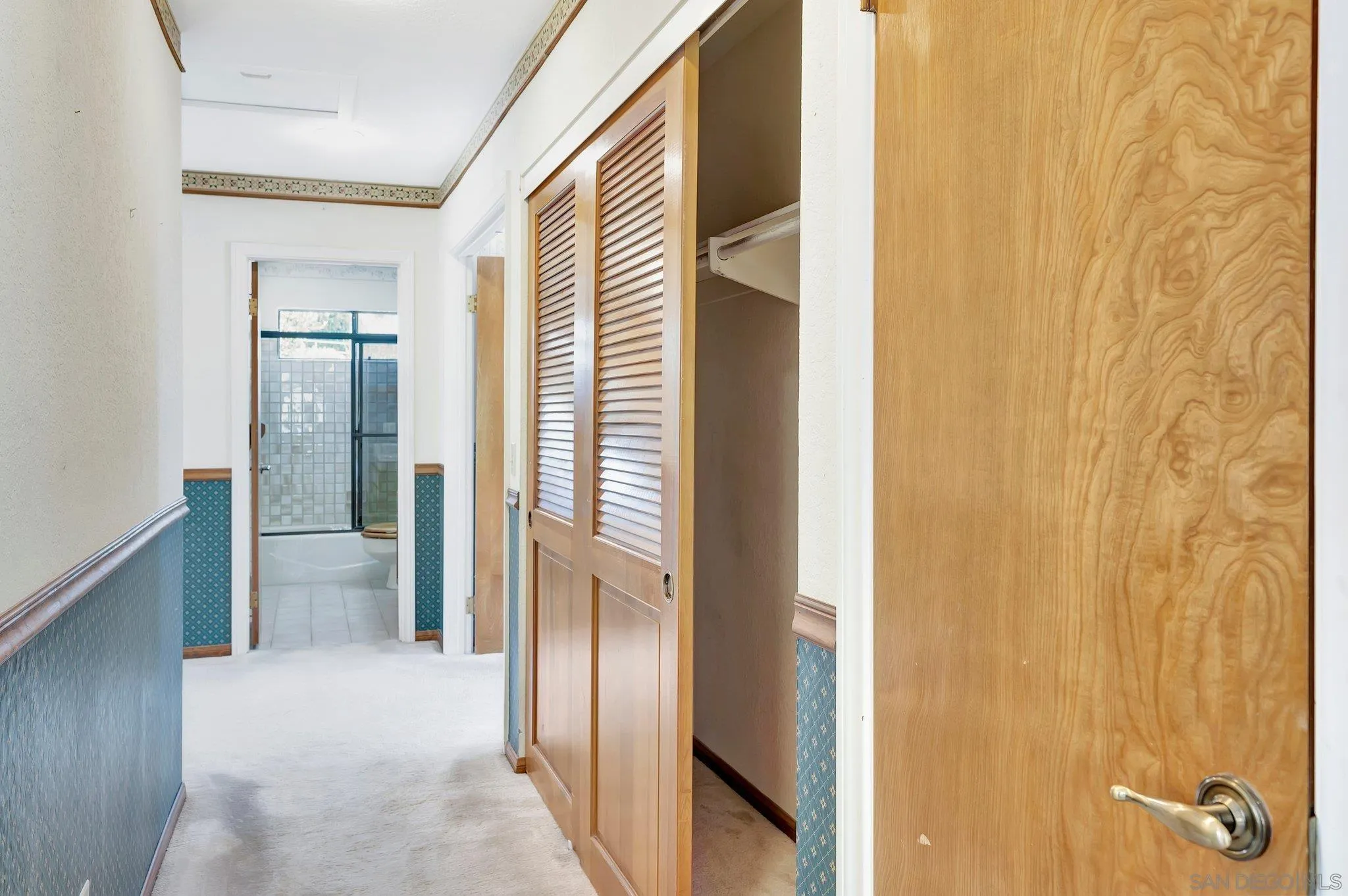 2596 Valetta Lane Alpine, CA 91901 - Photo 16 of 48 a view of a bathroom from a hallway