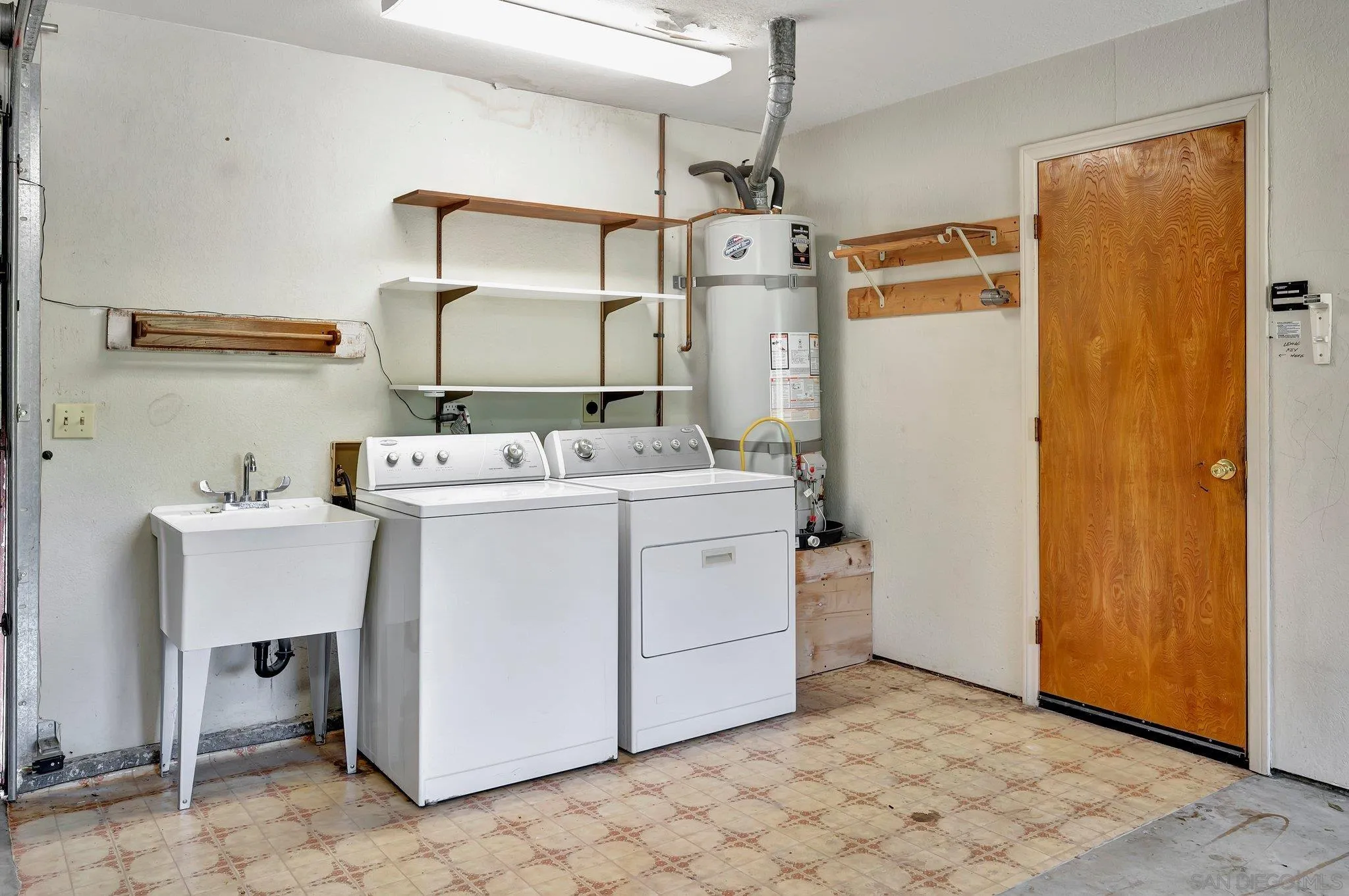 2596 Valetta Lane Alpine, CA 91901 - Photo 28 of 48 a utility room with dryer and washer