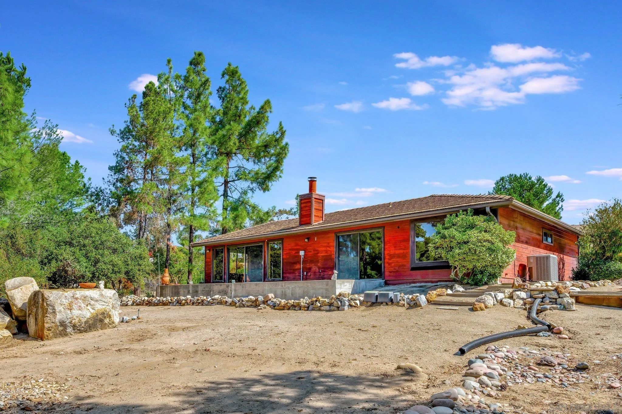 2596 Valetta Lane Alpine, CA 91901 - Photo 32 of 48 a front view of a house with a yard