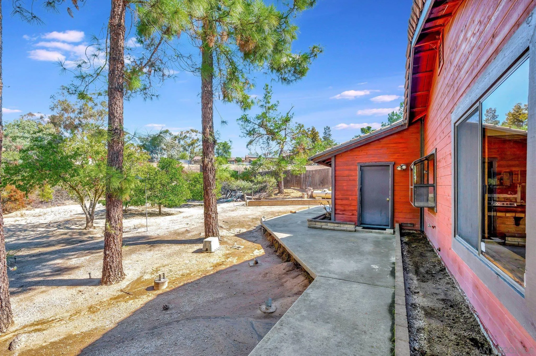2596 Valetta Lane Alpine, CA 91901 - Photo 36 of 48 a view of a house with backyard and sitting area
