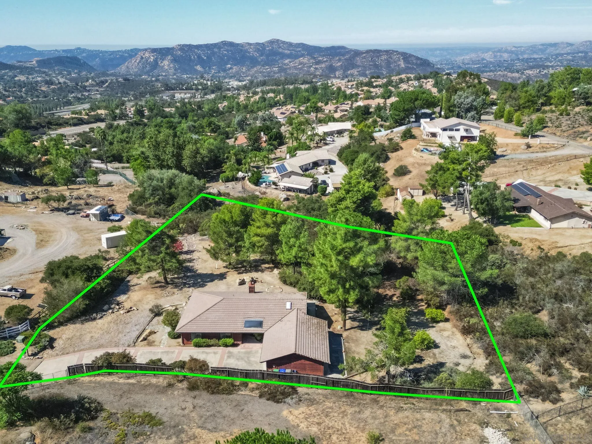 2596 Valetta Lane Alpine, CA 91901 - Photo 48 of 48 an aerial view of a house with a yard and mountain view in back