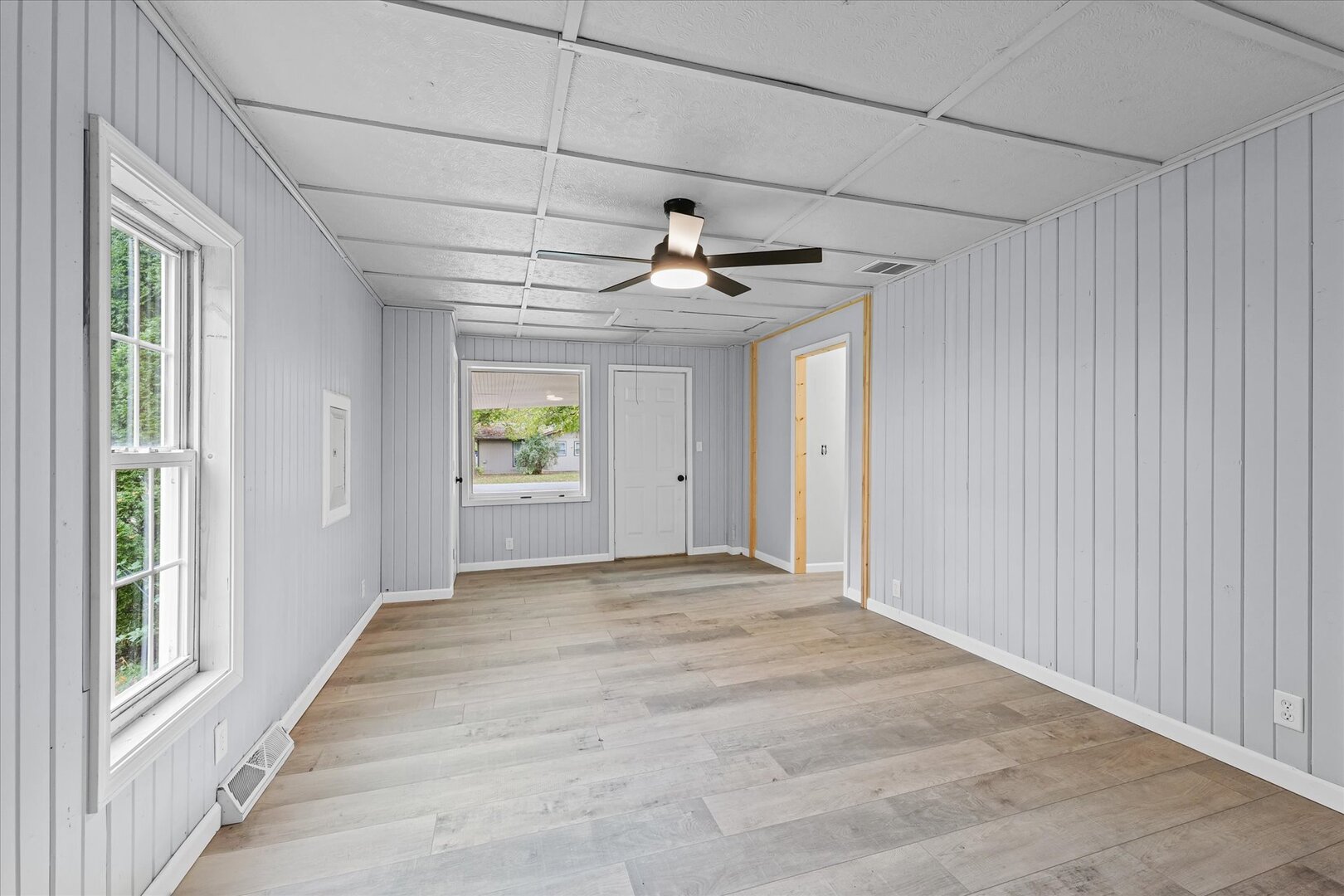 842 North Walnut Street Monticello, IL 61856 - Photo 16 of 33 a view of an empty room with a window