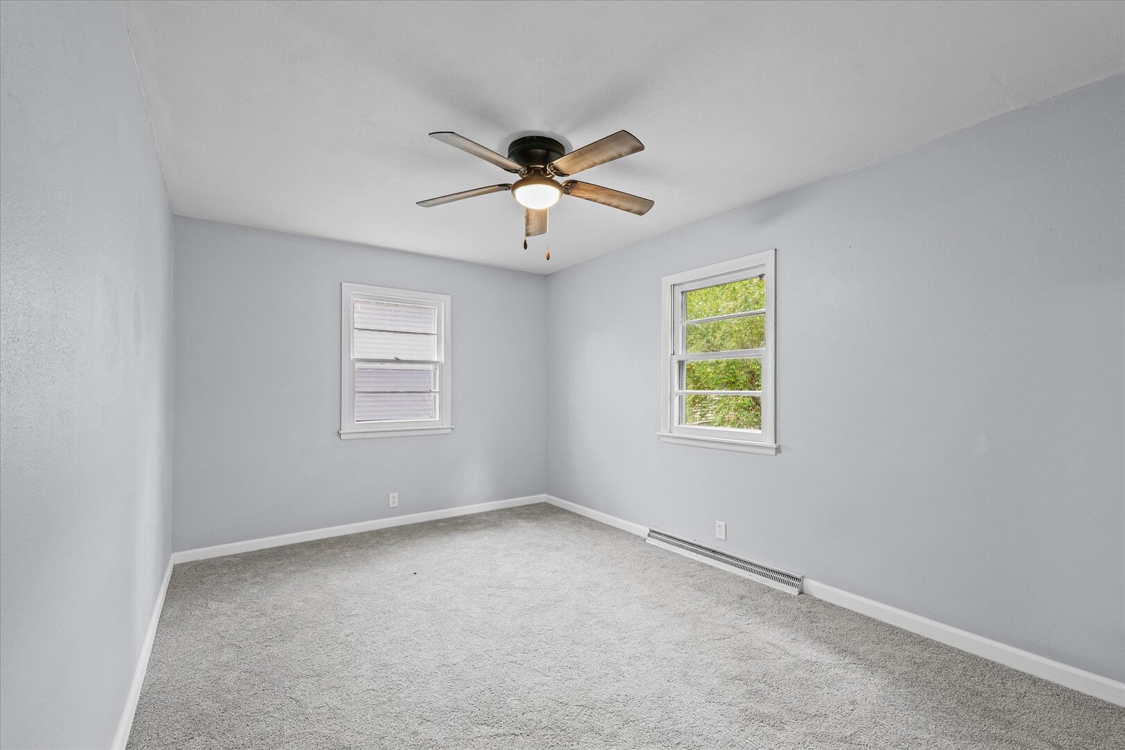 842 North Walnut Street Monticello, IL 61856 - Photo 19 of 33 a view of room with a ceiling fan and window
