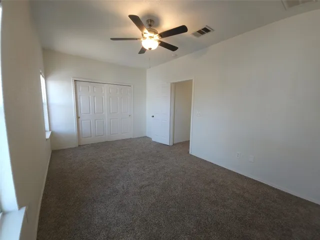 a bathroom with a sink toilet a mirror and shower