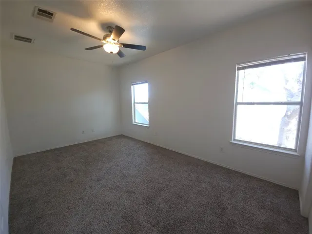 a view of a window in an empty room