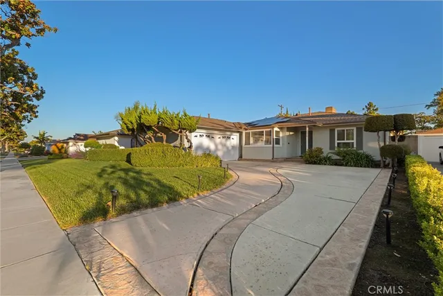 a view of a house with a swimming pool