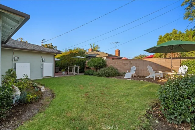 a house view with a garden space