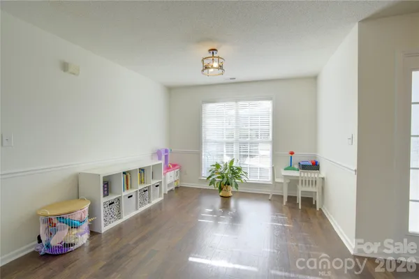 a view of livingroom with furniture and wooden floor