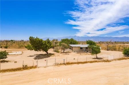 12782 Atsina Road Phelan, CA 92371 - Photo 17 of 18 a view of a ocean beach