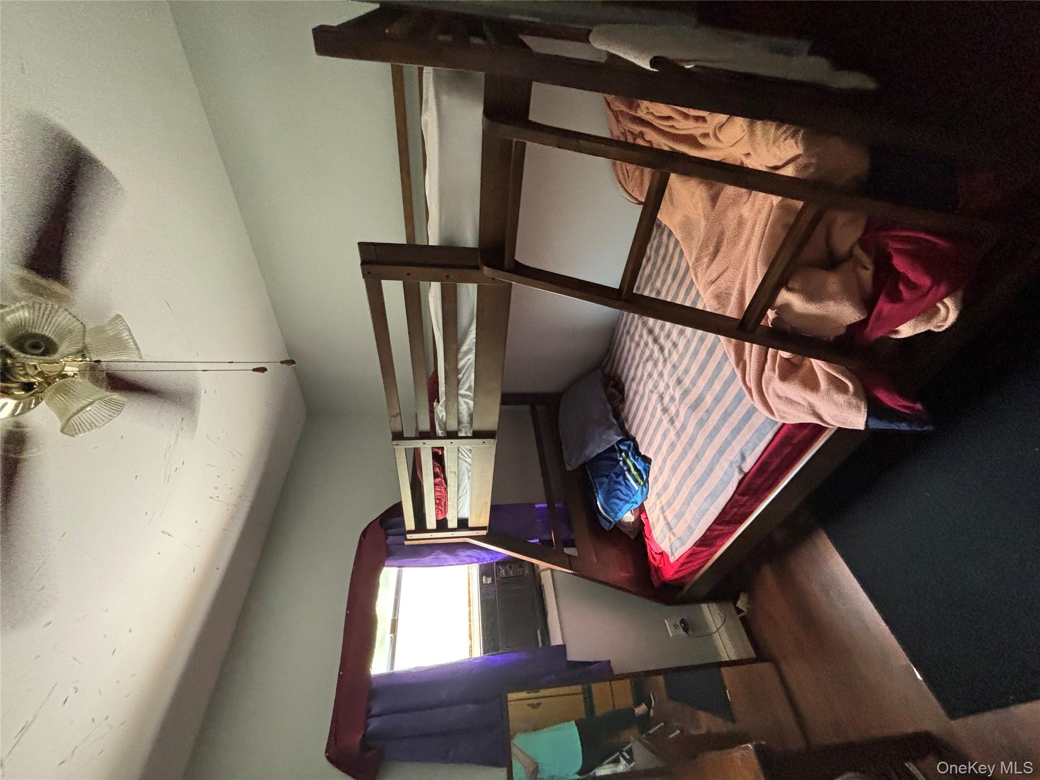 59 Windmill Road Hyde Park, NY 12601 - Photo 13 of 13 Bedroom with dark wood finished floors and ceiling fan