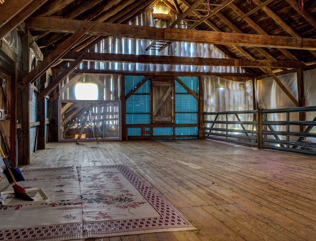 210 Wheeler Avenue Orange, MA 01364 - Photo 7 of 14 a view of a room with wooden floor
