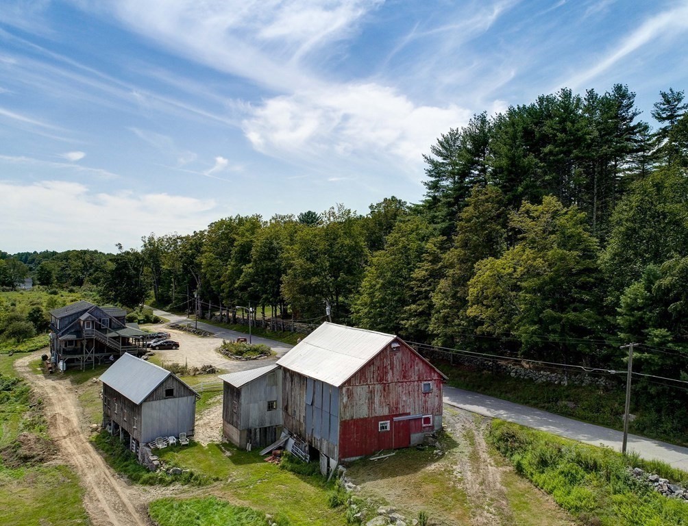 210 Wheeler Avenue Orange, MA 01364 - Photo 10 of 14 an aerial view of a house with swimming pool and big yard