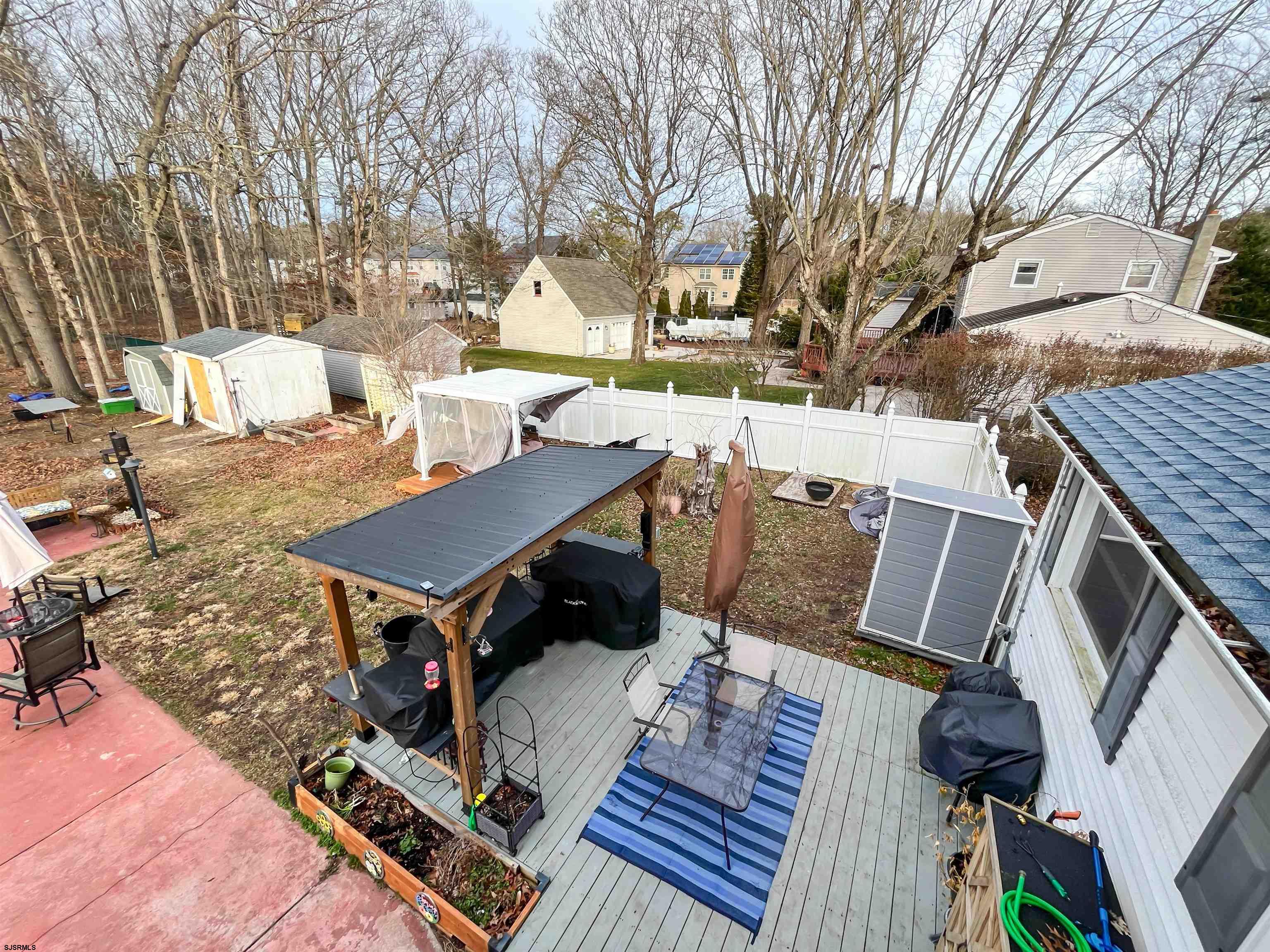522 Zion Road Egg Harbor Township, NJ 08234 - Photo 18 of 42 a view of a patio with iron fence
