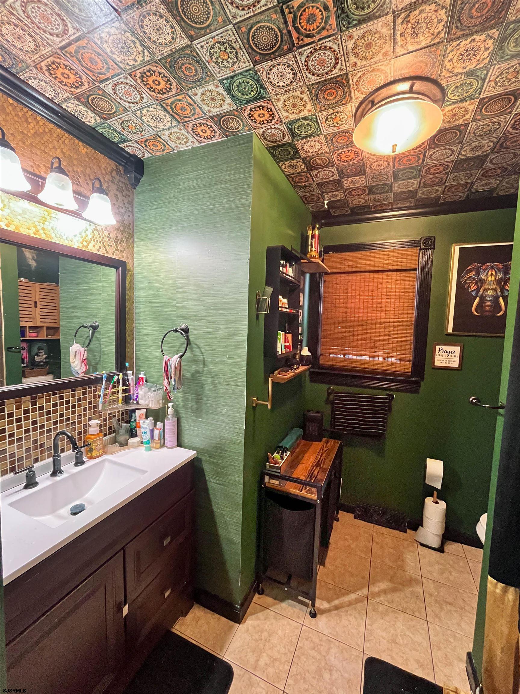 522 Zion Road Egg Harbor Township, NJ 08234 - Photo 22 of 42 a bathroom with sink and mirror