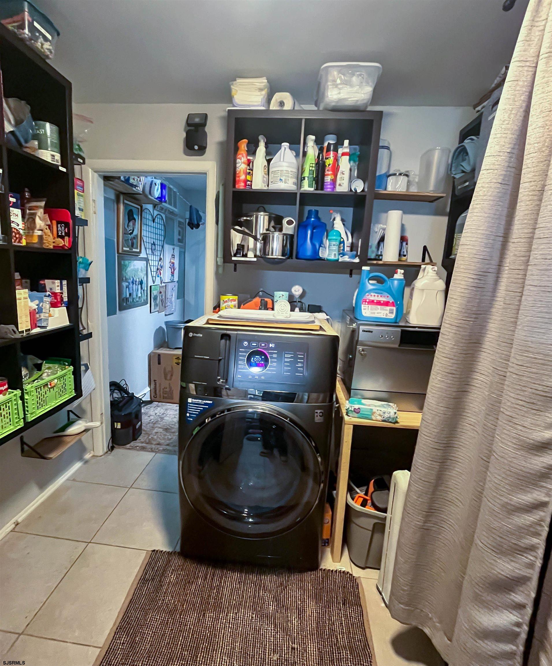 522 Zion Road Egg Harbor Township, NJ 08234 - Photo 25 of 42 a room with furniture and a book shelf