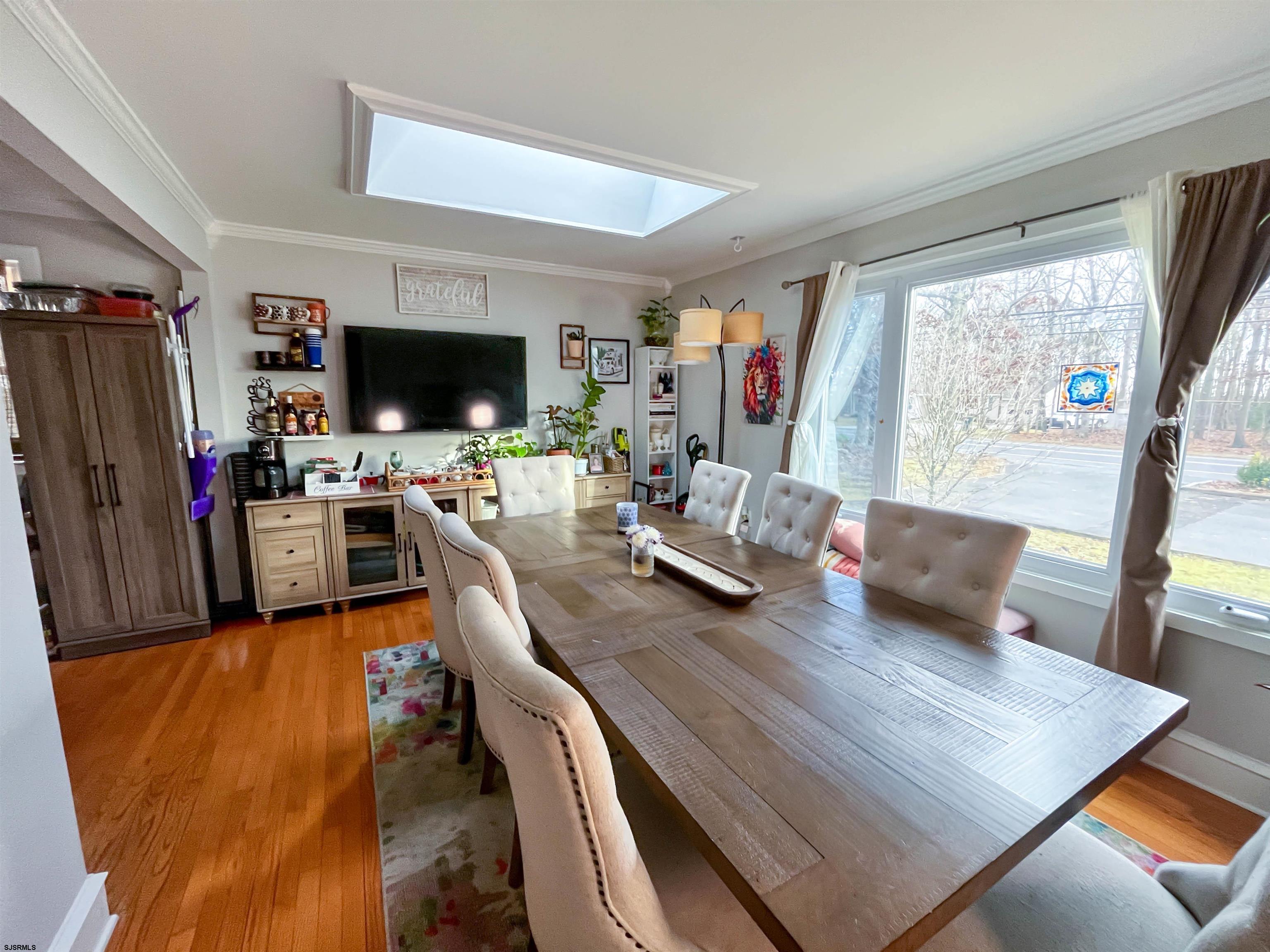 522 Zion Road Egg Harbor Township, NJ 08234 - Photo 3 of 42 a living room with furniture and a flat screen tv