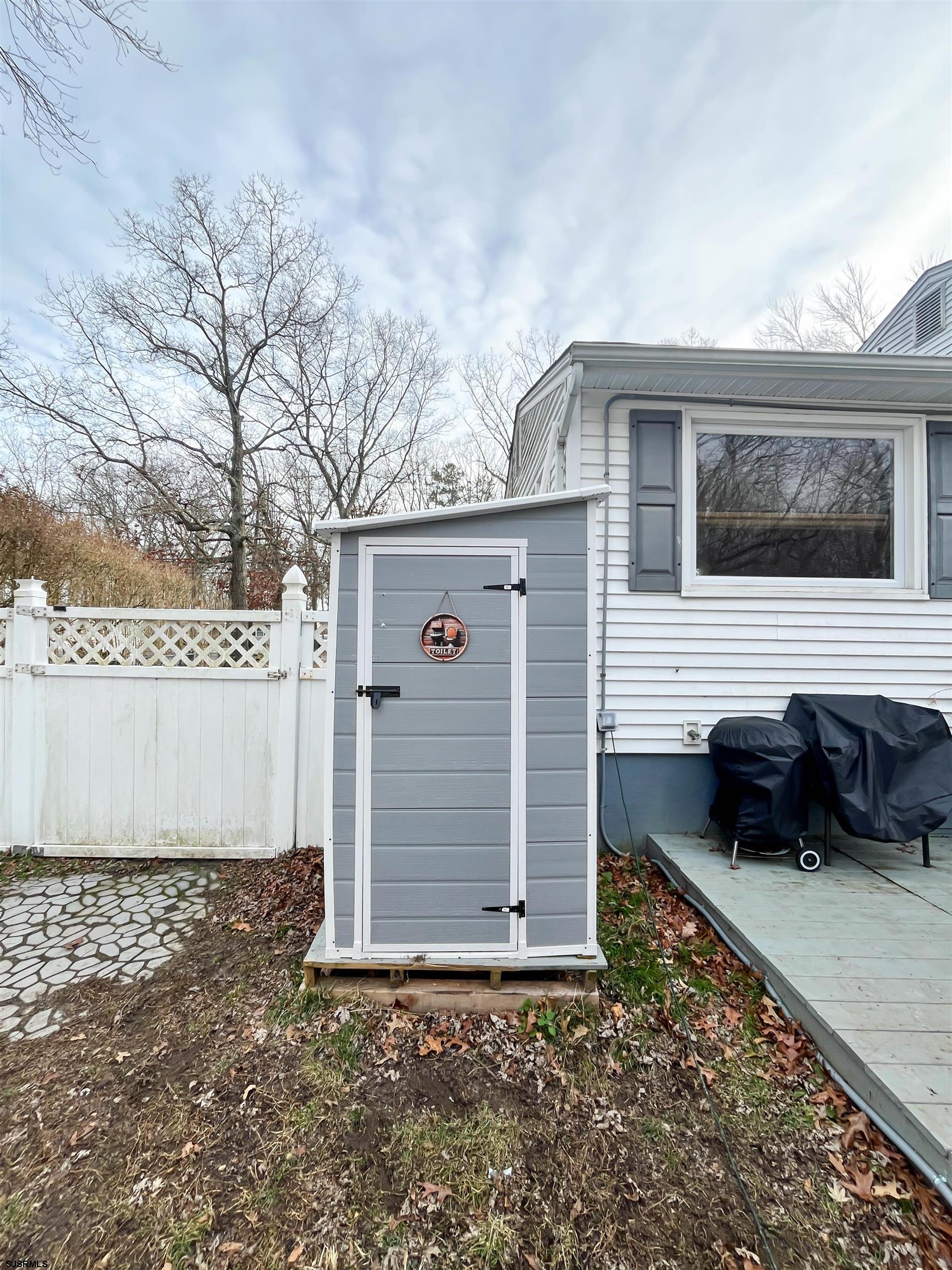 522 Zion Road Egg Harbor Township, NJ 08234 - Photo 36 of 42 a view of a house with a yard