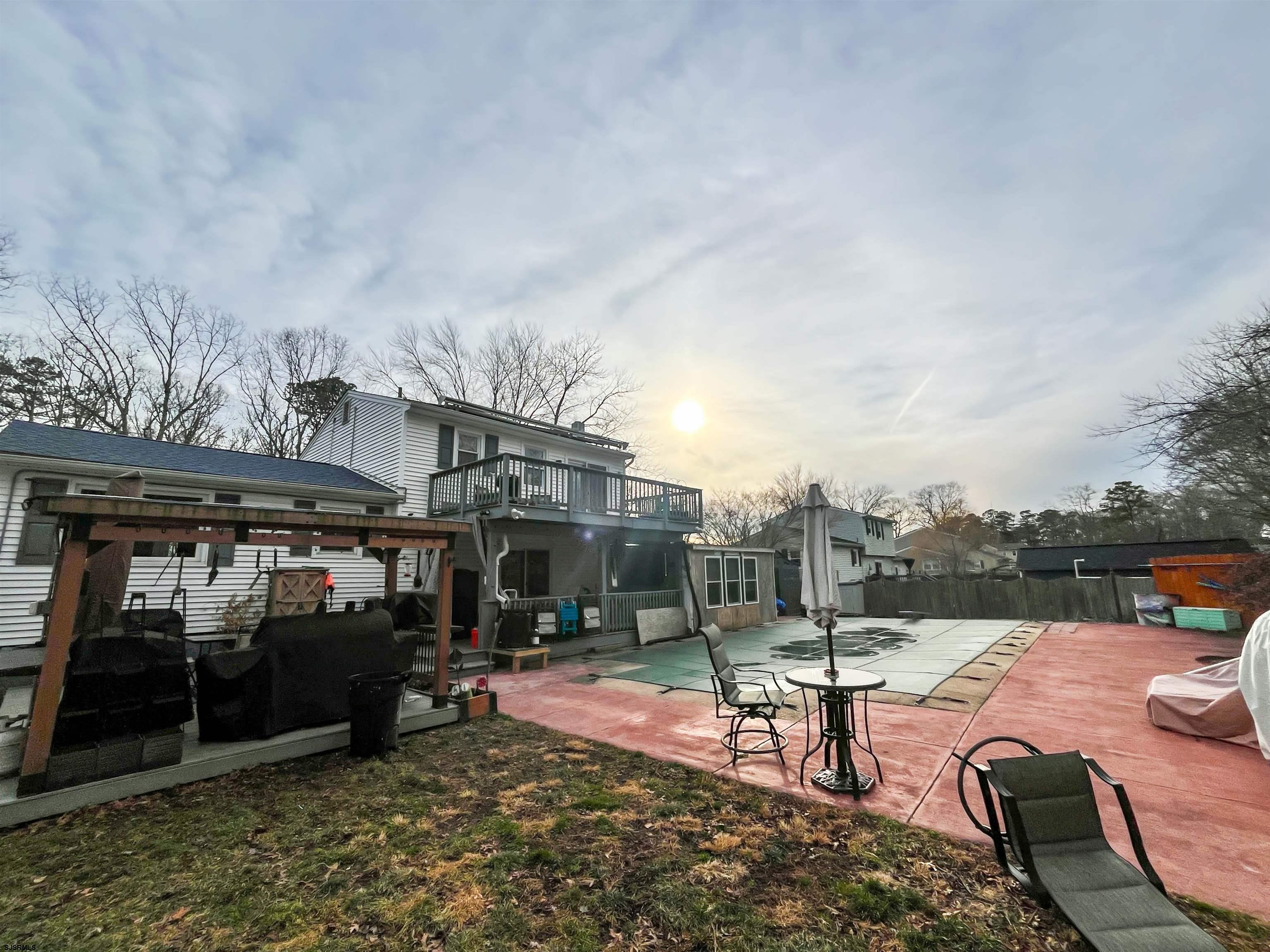 522 Zion Road Egg Harbor Township, NJ 08234 - Photo 38 of 42 a view of a patio with swimming pool and sitting area