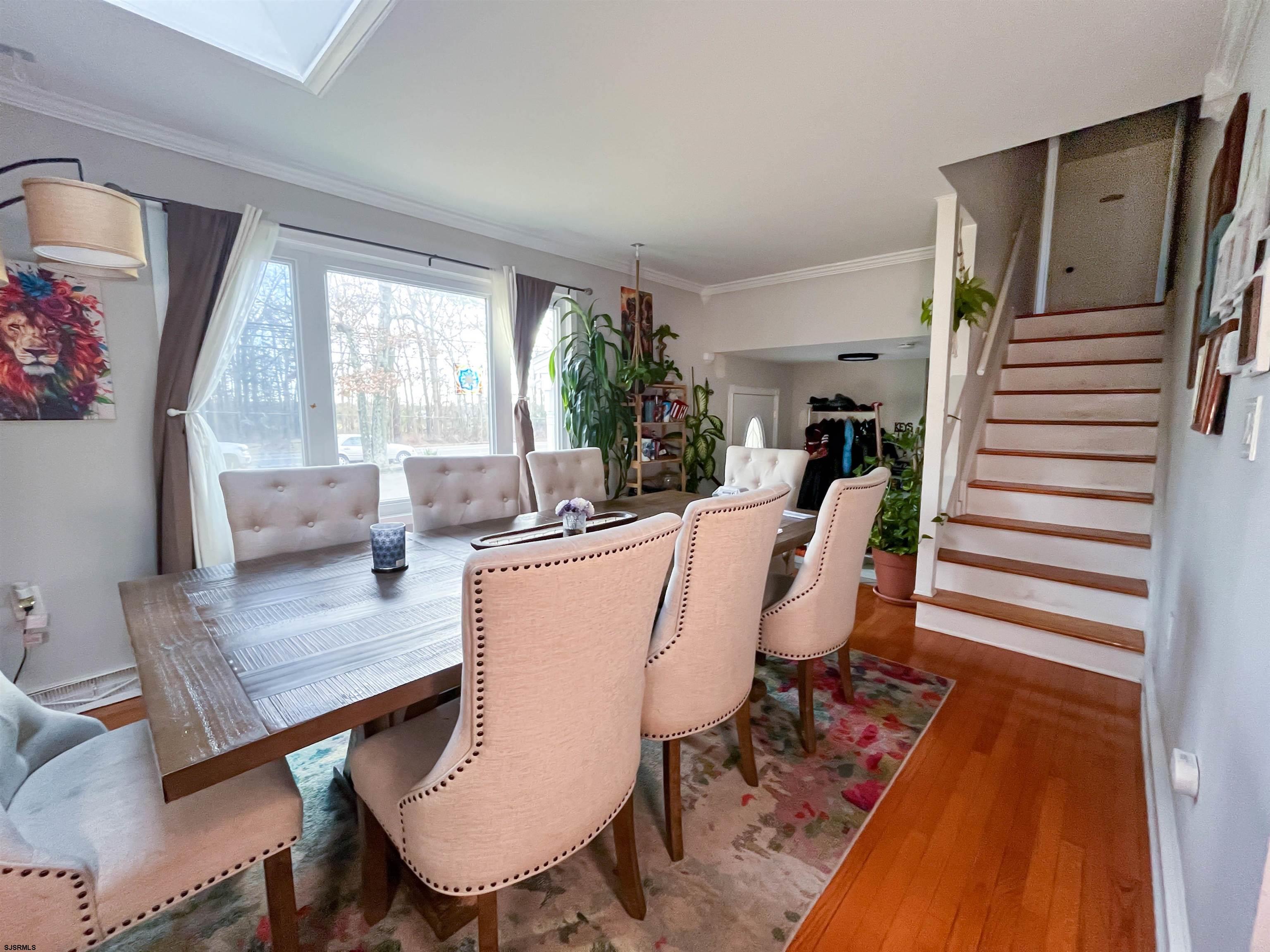 522 Zion Road Egg Harbor Township, NJ 08234 - Photo 4 of 42 a view of a dining room with furniture window and wooden floor