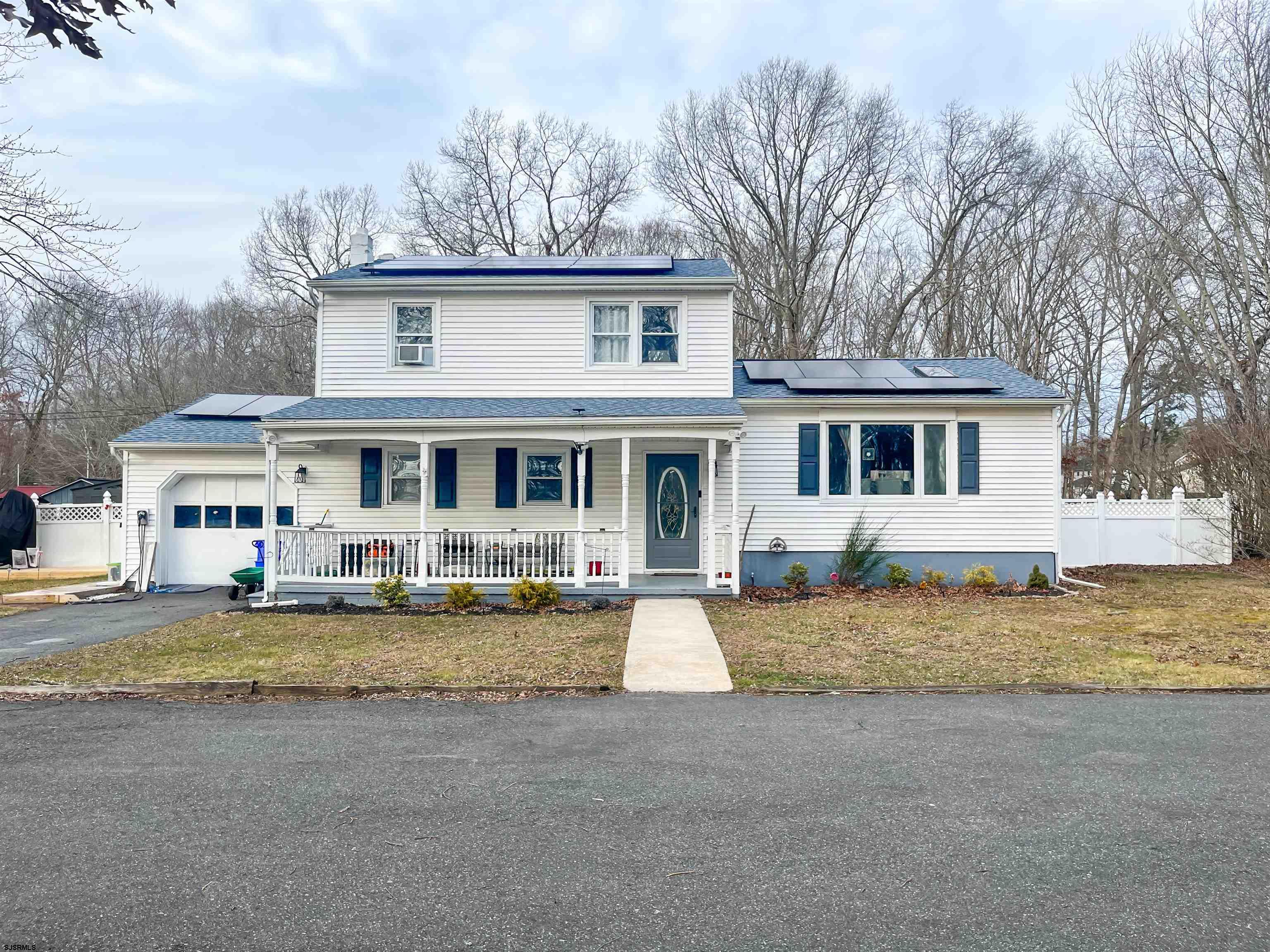522 Zion Road Egg Harbor Township, NJ 08234 - Photo 42 of 42 a front view of a house with a yard
