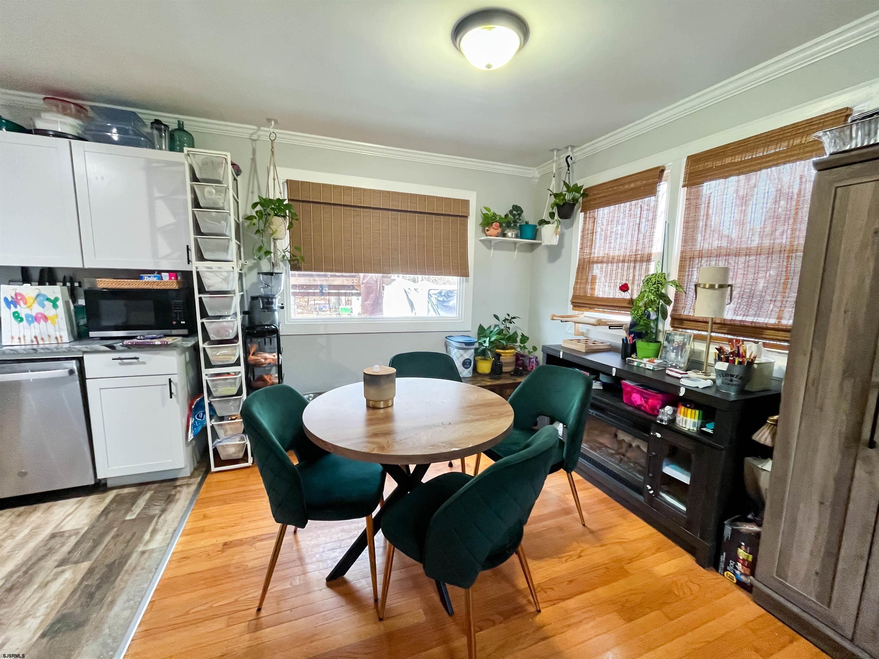 522 Zion Road Egg Harbor Township, NJ 08234 - Photo 5 of 42 a dining room with furniture and wooden floor