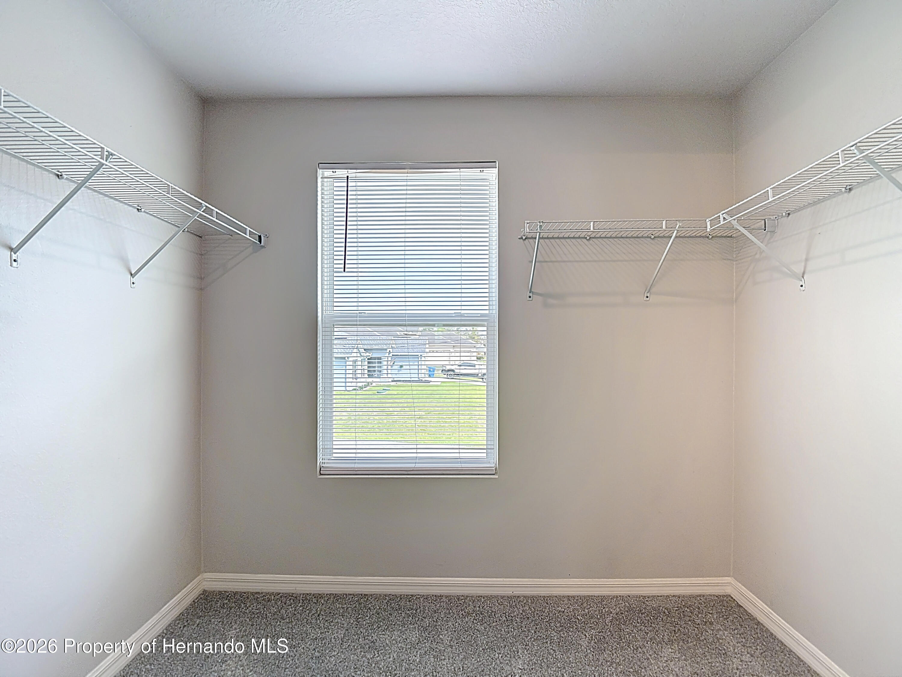 11374 Marcella Avenue Weeki Wachee, FL 34614 - Photo 44 of 70 a view of a room that has a window in it