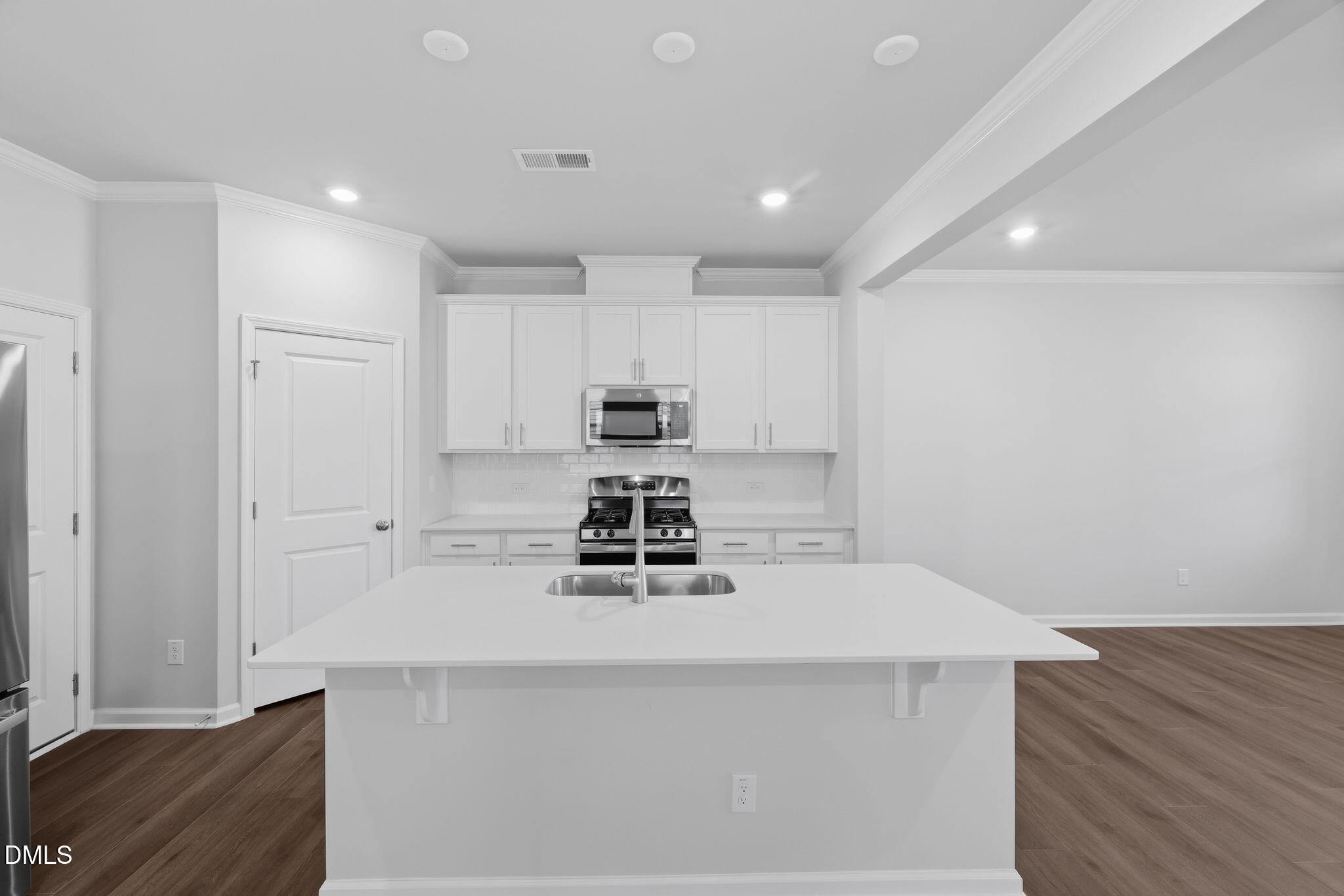 1340 Adler Cv Lane Graham, NC 27253 - Photo 7 of 38 SUN_Sagecroft_Pic_Spencer_QMI_74_Kitchen