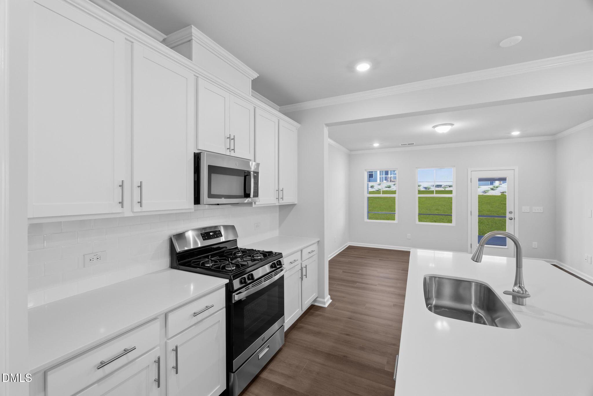 1340 Adler Cv Lane Graham, NC 27253 - Photo 8 of 38 SUN_Sagecroft_Pic_Spencer_QMI_74_Kitchen