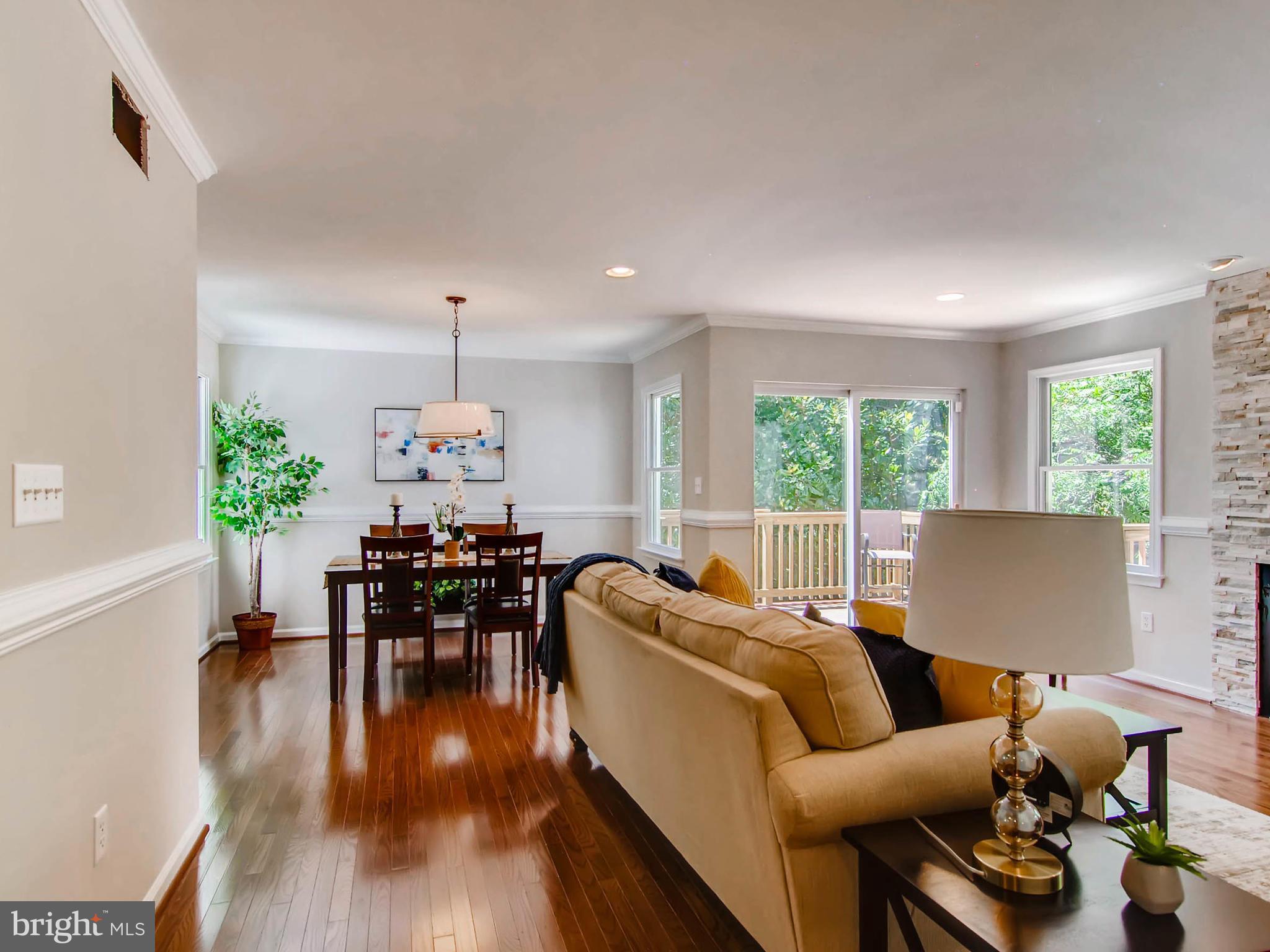 1606 Frederick Road Baltimore, MD 21228 - Photo 11 of 28 a living room with furniture and a large window