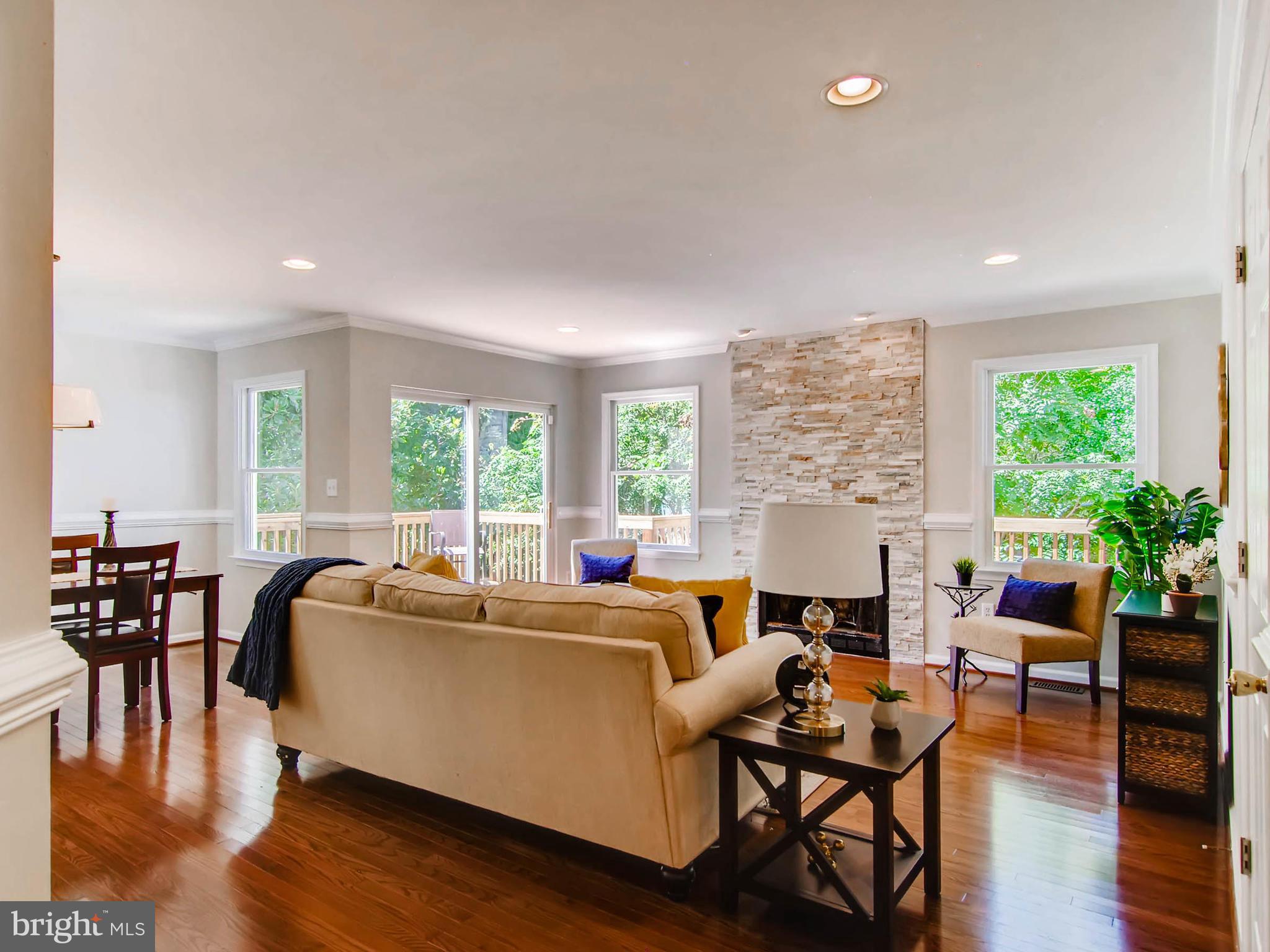1606 Frederick Road Baltimore, MD 21228 - Photo 8 of 28 a living room with furniture and a large window