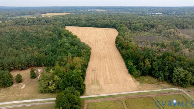 a view of a swimming pool with a yard