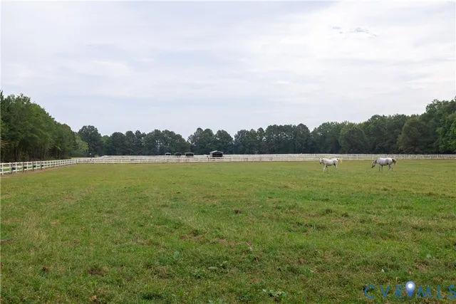 a view of a house with a big yard
