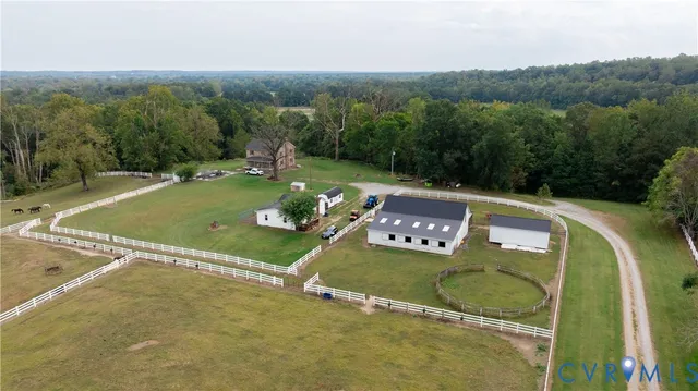 a view of a swimming pool with a yard