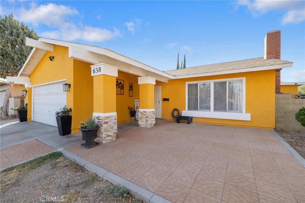 638 Eston Place Lancaster, CA 93535 - Photo 1 of 44 a backyard of a house with seating space