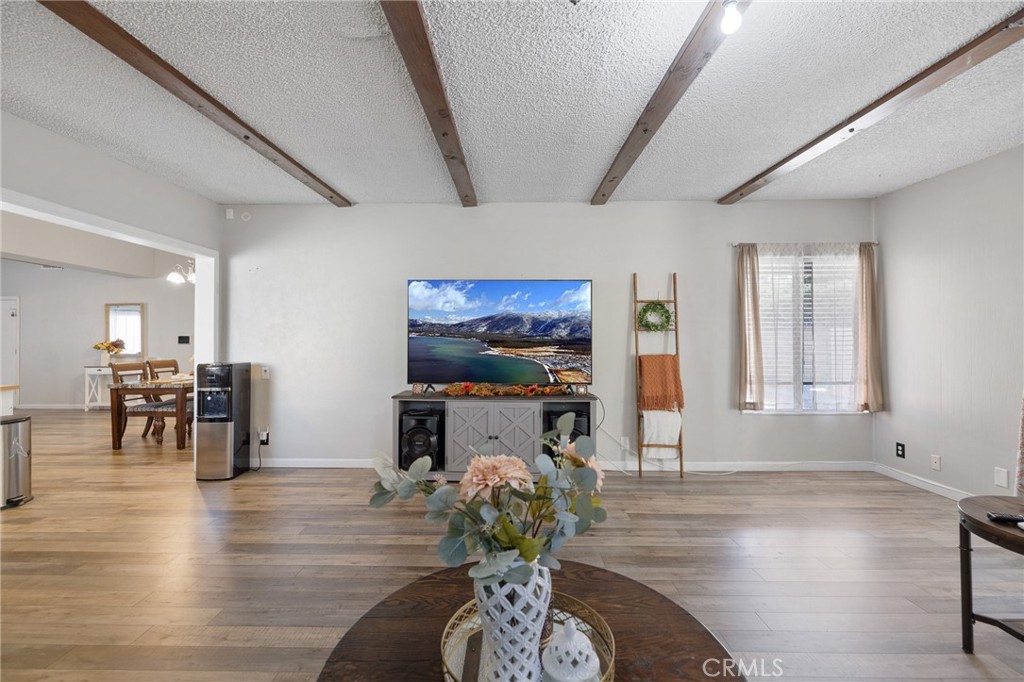 638 Eston Place Lancaster, CA 93535 - Photo 19 of 44 a living room with furniture and wooden floor